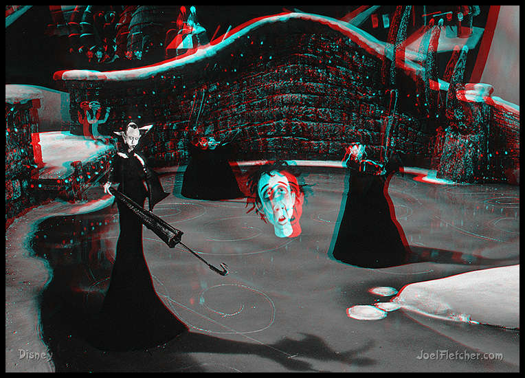 Vampires play hockey with Tim Burton head.