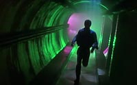Man runs in a sewer movie set